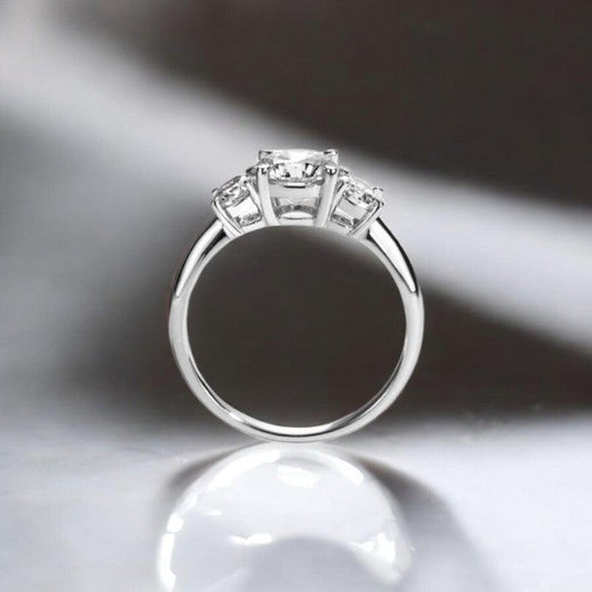 3 Stone design engagement ring with lab cultivated diamonds sparking, 14 karat white gold