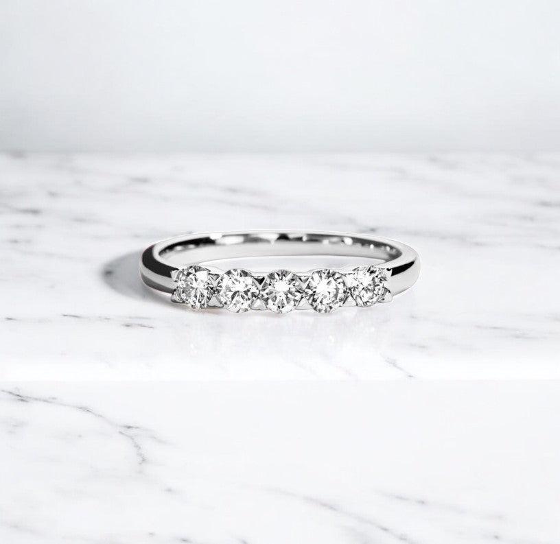 Sparkling stunning engagement ring with lab cultivated diamonds, made with 14 karat gold