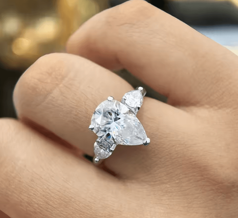 Waterdrop moissanite engagement ring with 925 sterling silver, one main stone with 2 side stones, sparking moissanite