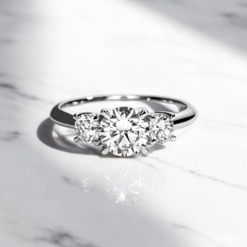3 Stone design engagement ring with lab cultivated diamonds sparking, 14 karat white gold