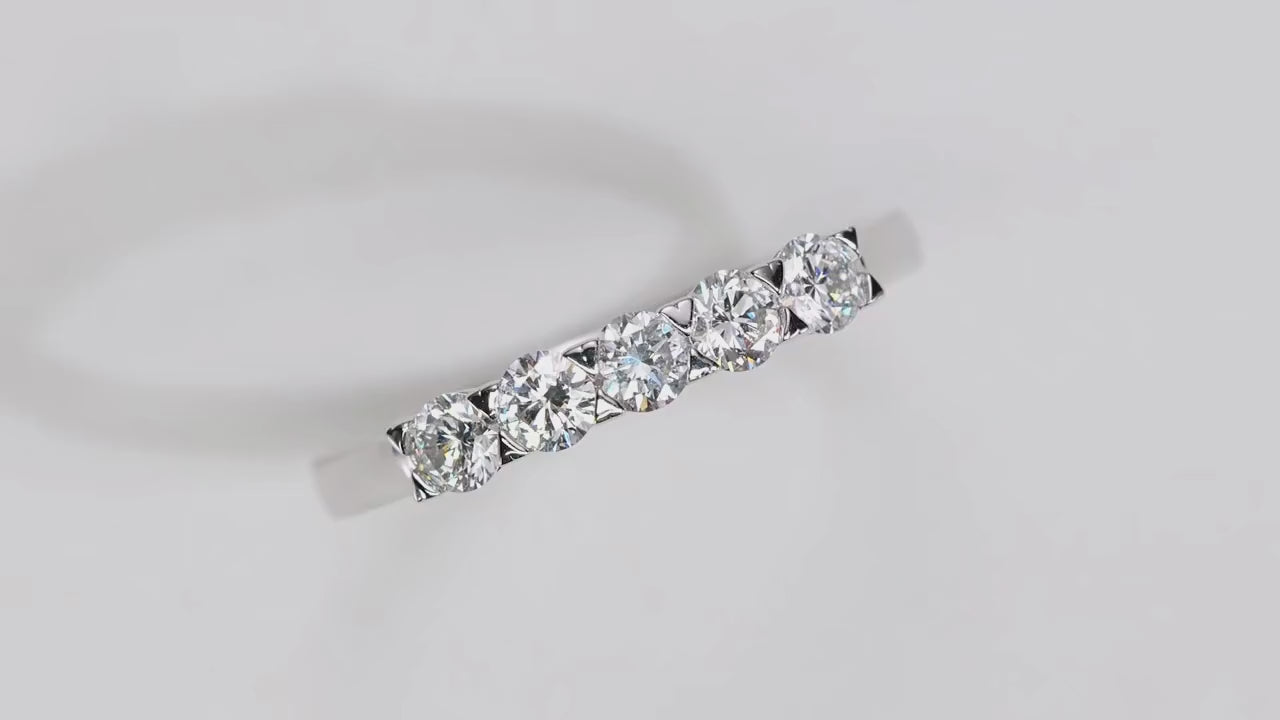 Video of a sparkling stunning engagement ring with lab cultivated diamonds, made with 14 karat gold